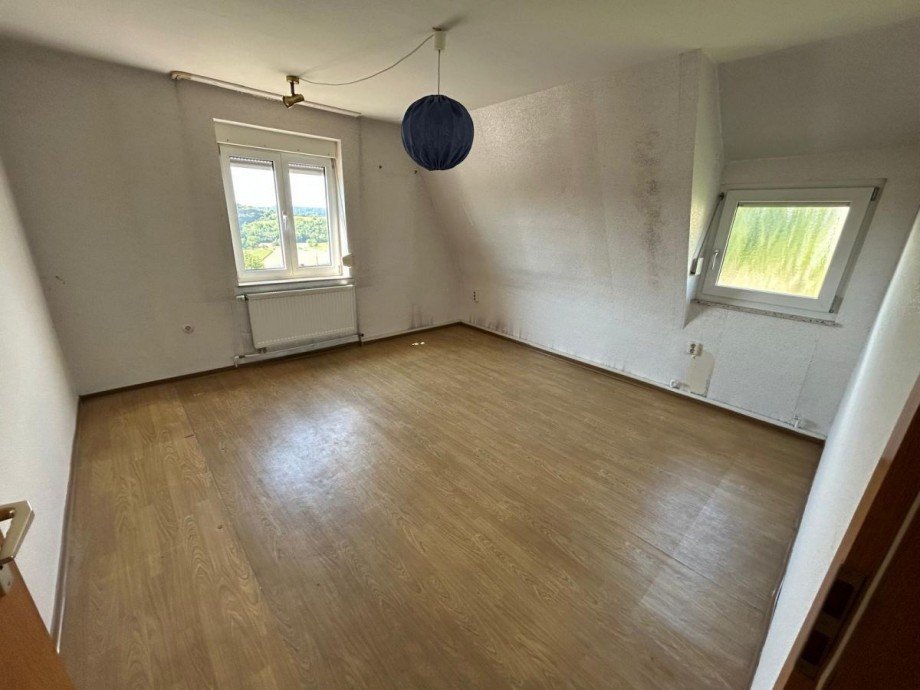 Schlafzimmer 1. Dachgescho� Haus Neudenau